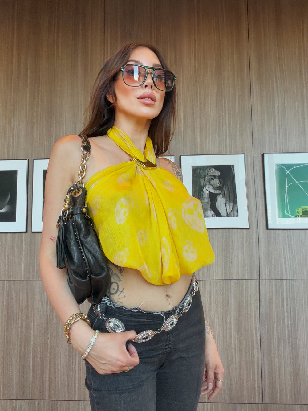 Nicole wearing a scarf top with Kitdo