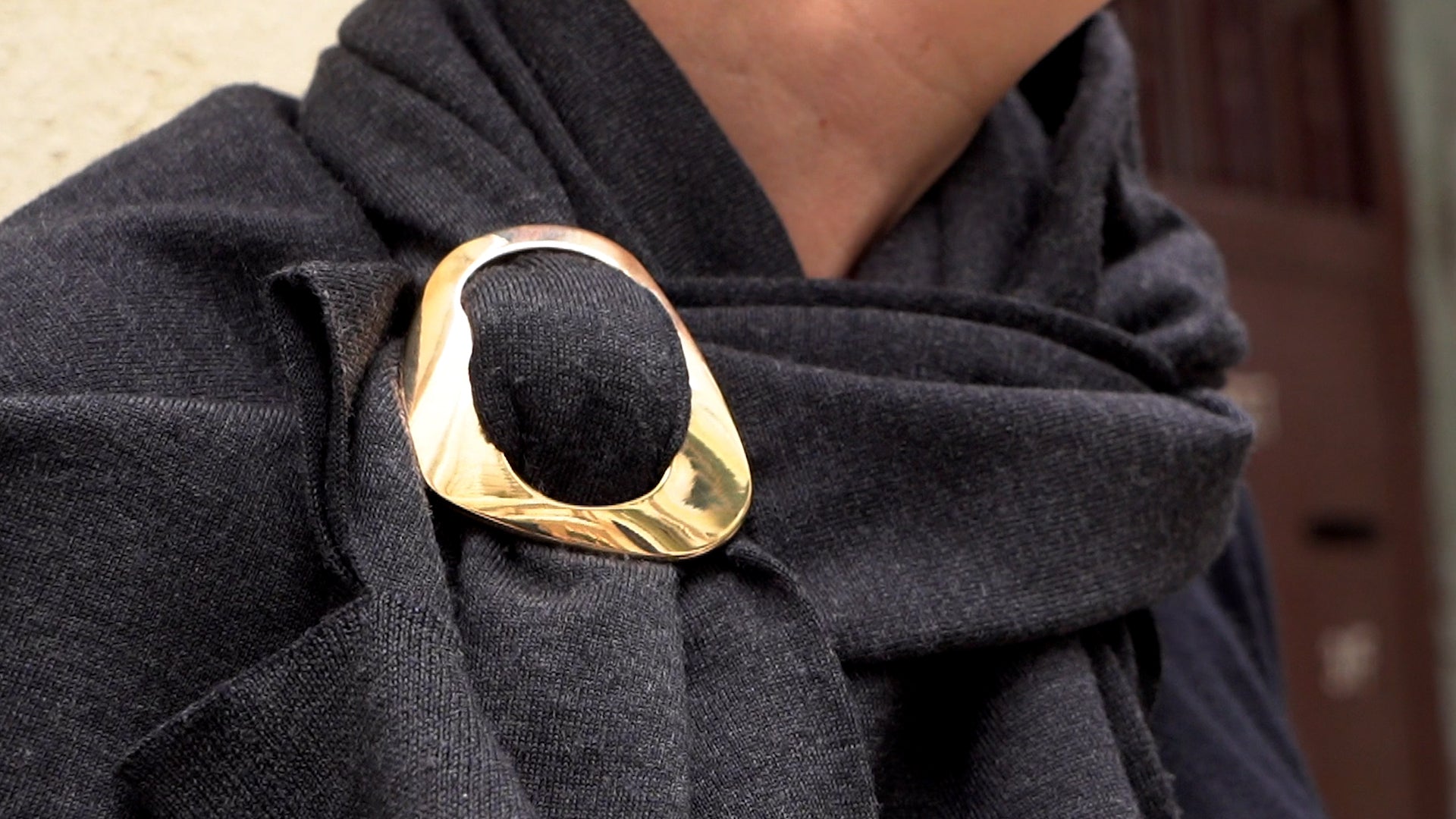 Using magnetic clothing clip to keep in place with a sweater